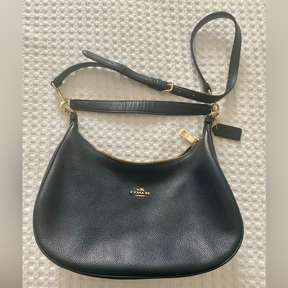 NWOT, never used, navy blue leather with gold hardware, cross-body/handbag!!